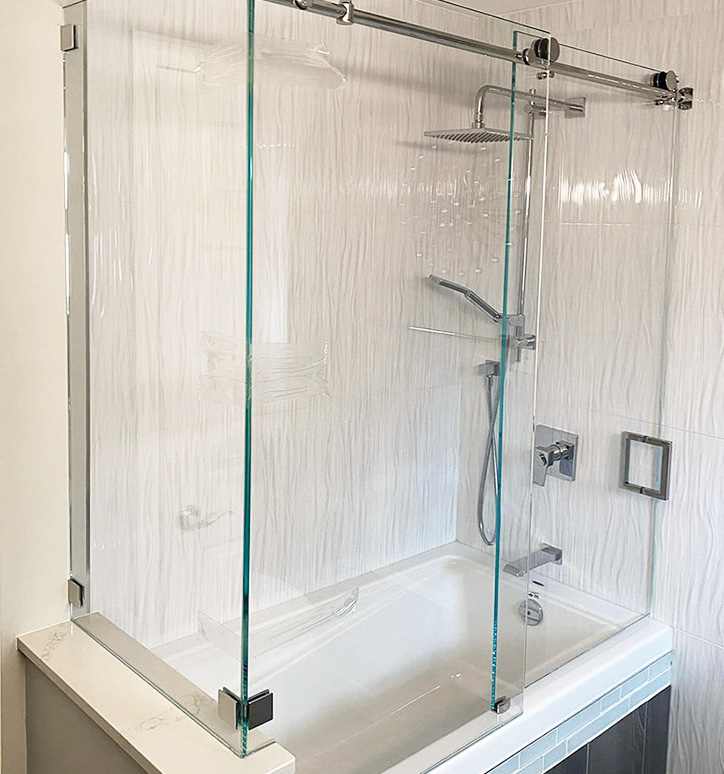 frameless tub shower enclosure